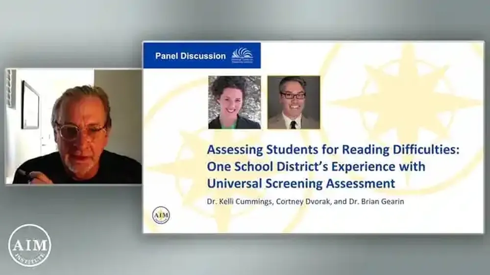 Man in glasses speaks during a virtual panel discussion on assessing students for reading difficulties.